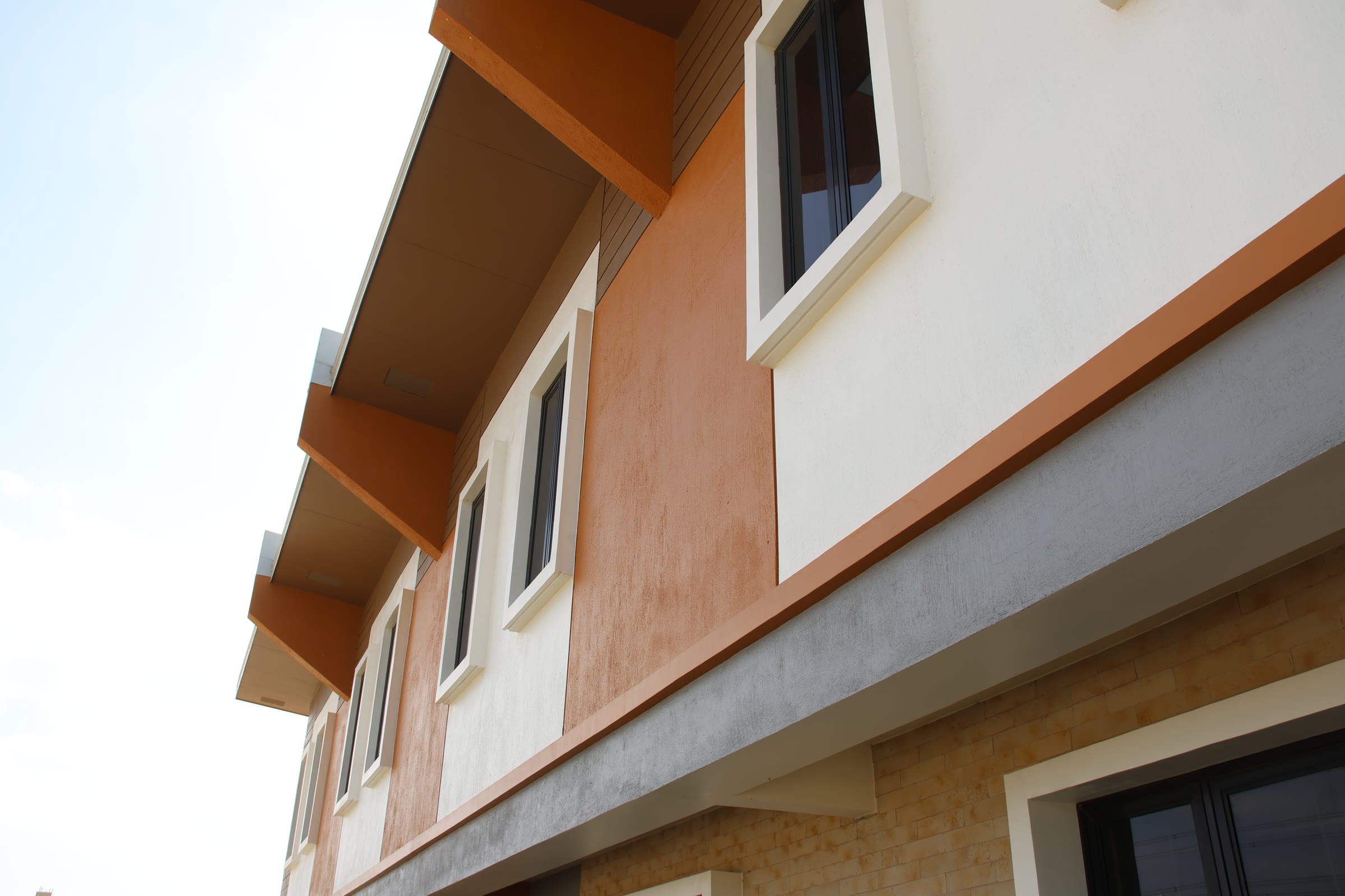 Low-angle architectural detail of Levana townhomes at Estella